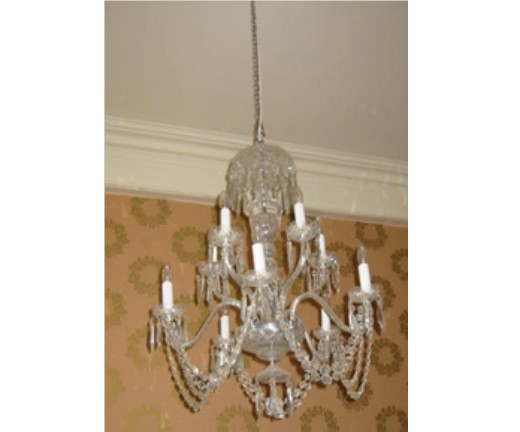 A PAIR OF WATERFORD CUT GLASS CHANDELIERS, 20th century, each with baluster stem issuing ten lights Image