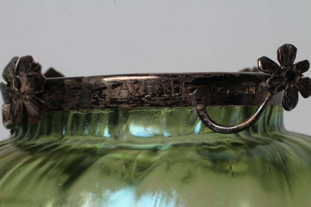 A TIFFANY STYLE IRIDESCENT GREEN GLASS VASE of flared round cylindrical form with bark type moulding Image