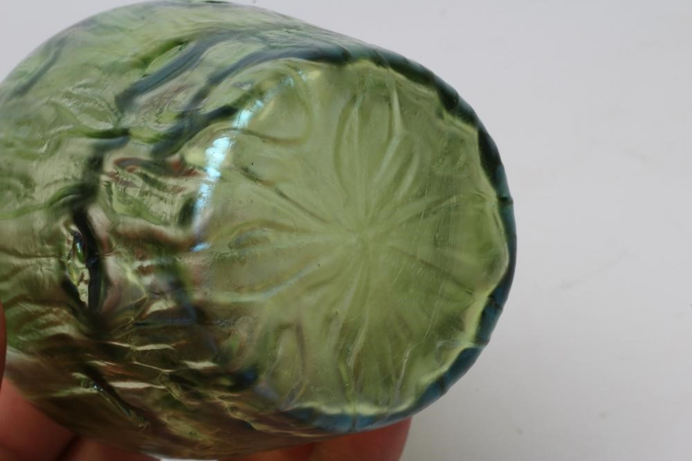 A TIFFANY STYLE IRIDESCENT GREEN GLASS VASE of flared round cylindrical form with bark type moulding Image