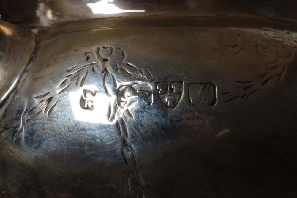 A BACHELOR'S EDWARDIAN SILVER THREE PIECE TEA SERVICE Image