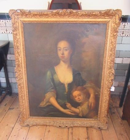 FOLLOWER OF GODFREY KNELLER (1646-1723) Portrait of a Lady, half length with a Young Child, oil on Image