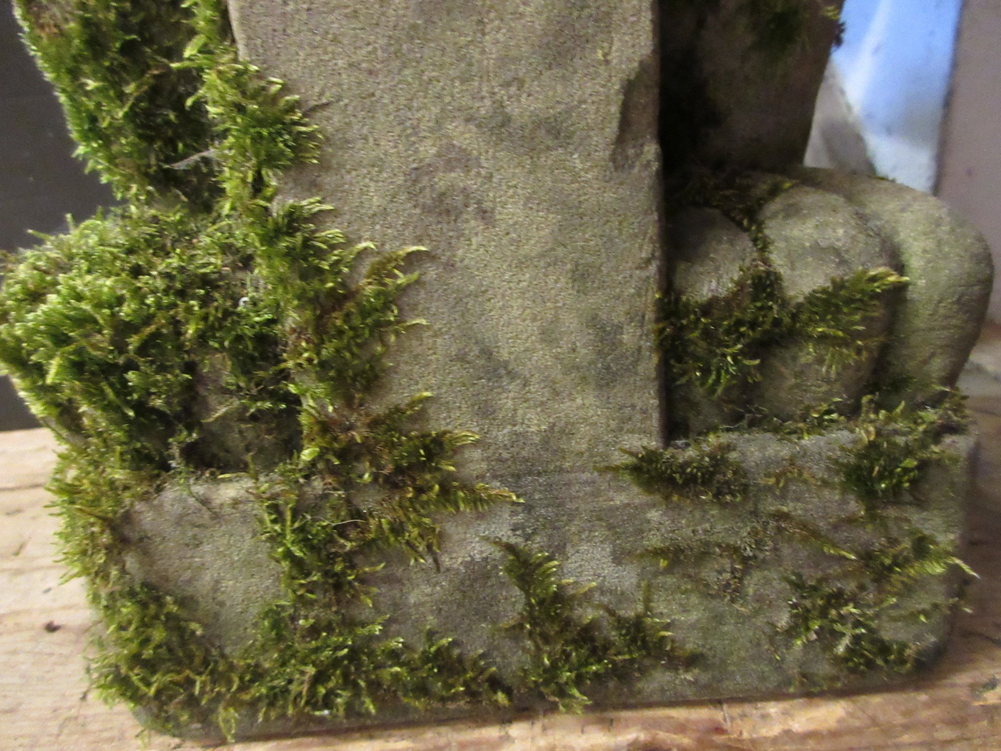 A CARVED SANDSTONE BEARDED GARGOYLE modelled seated with paw feet and open mouth, 7" x 20 1/2" Image