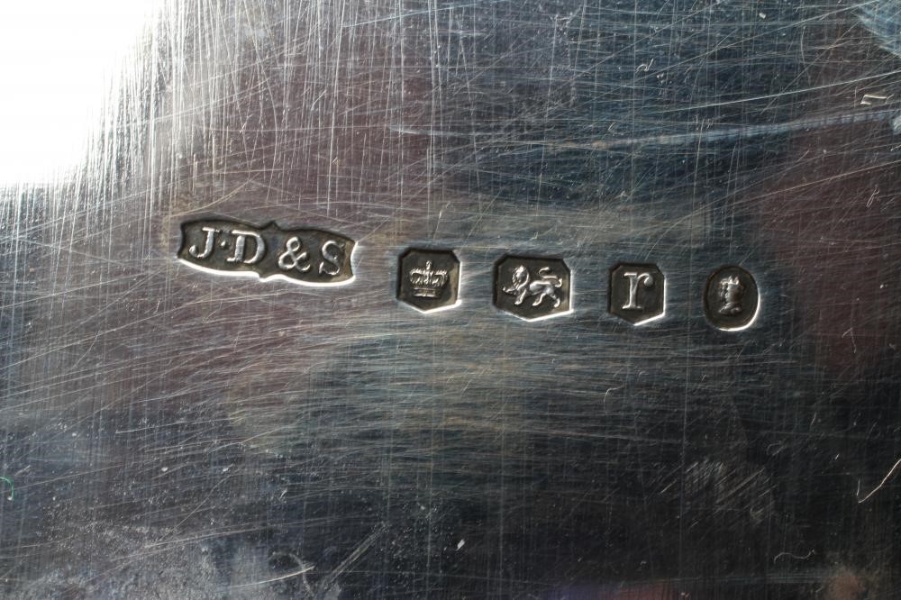 A SMALL SILVER SALVER, by James Dixon & Sons, Sheffield 1934, of shaped circular form with pie-crust Image