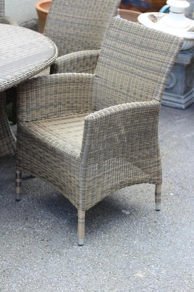 A HARTMAN RESIN WEAVE DINING SUITE Image