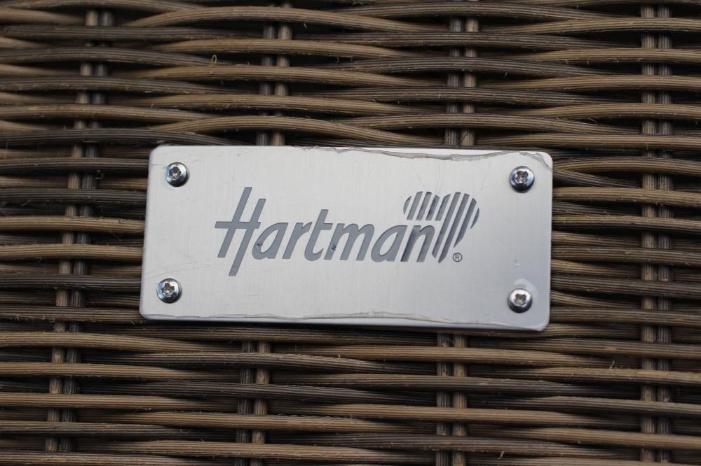 A HARTMAN RESIN WEAVE DINING SUITE Image