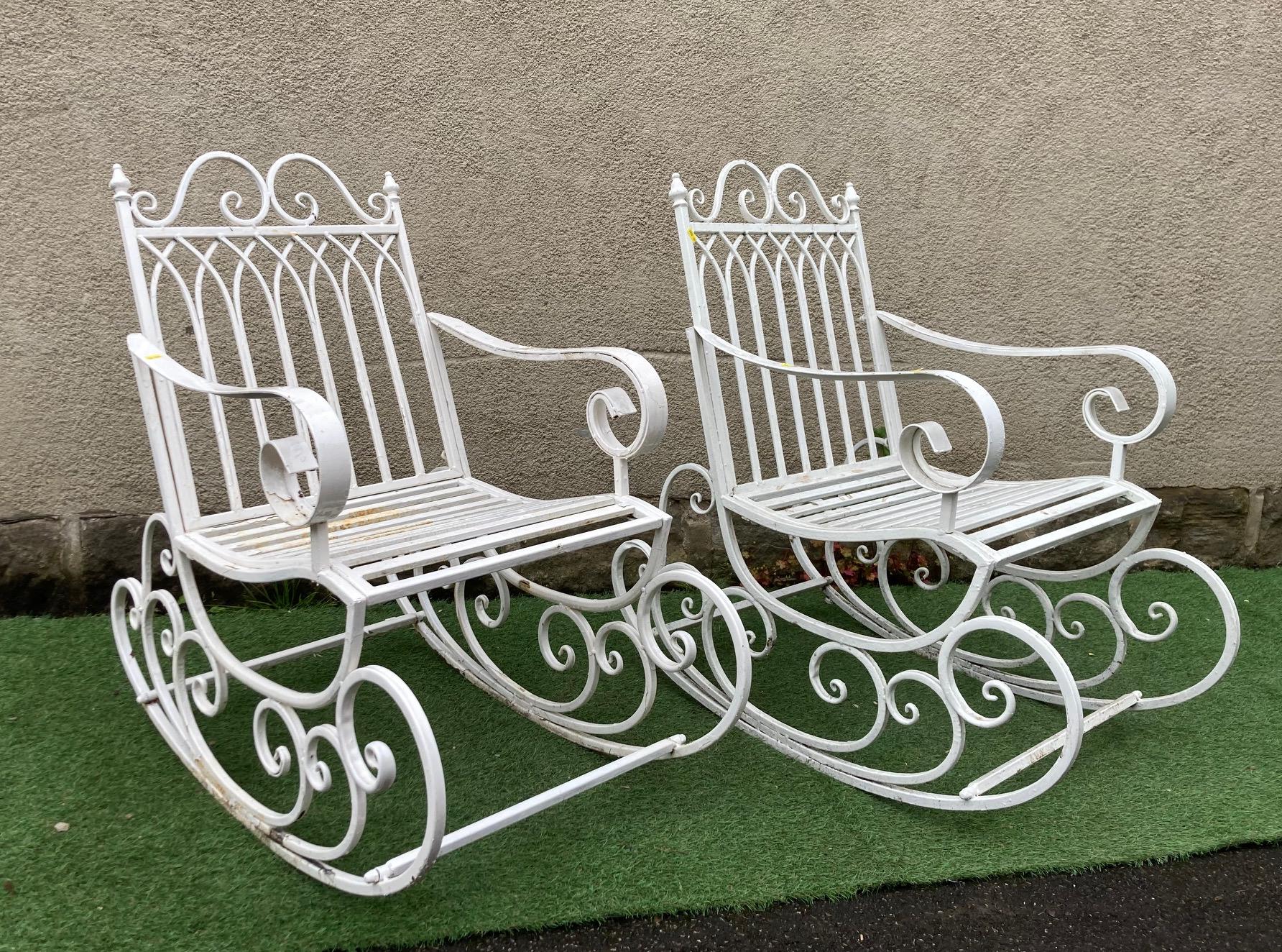 A PAIR OF METAL ROCKING CHAIRS Image