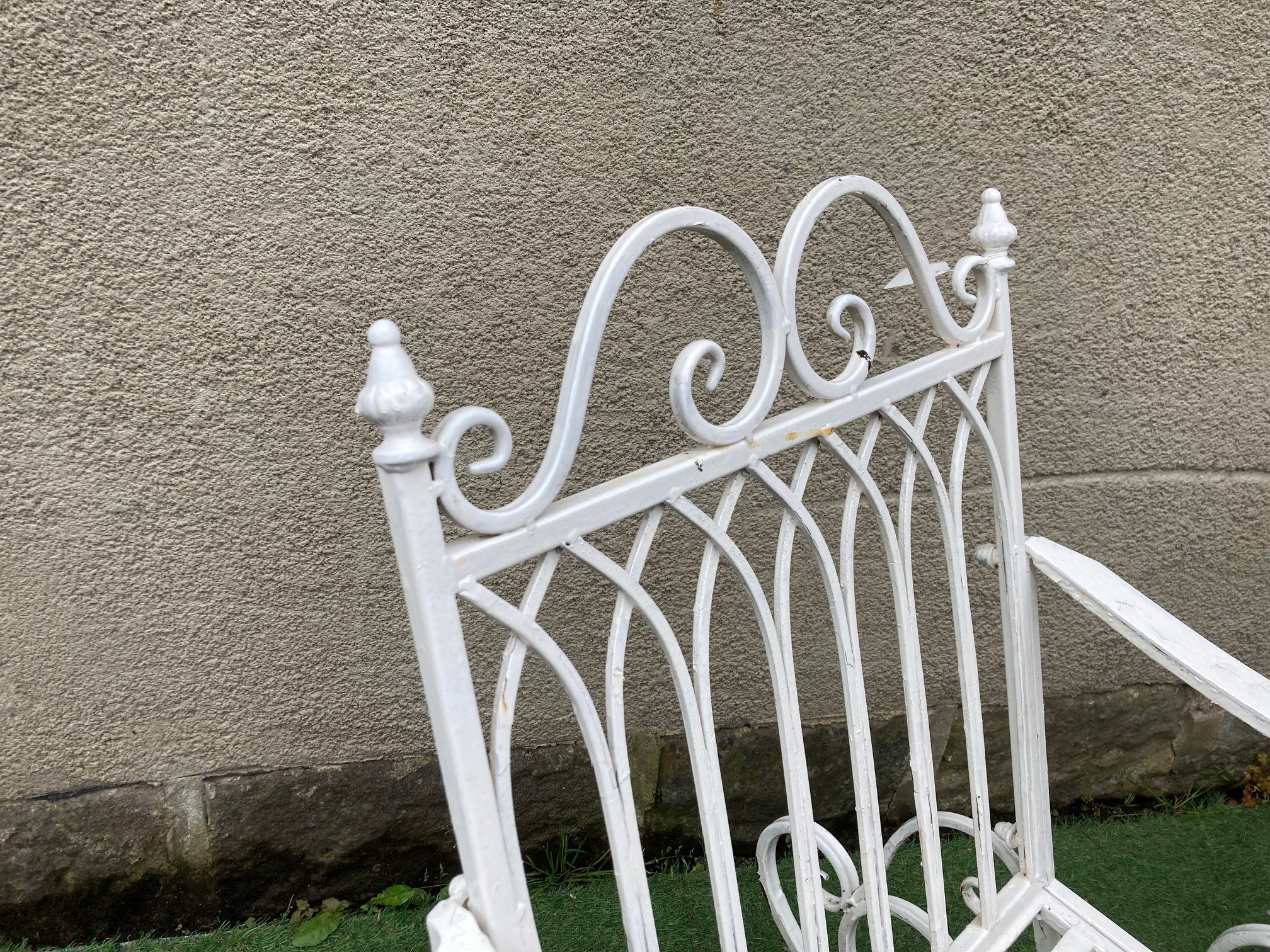 A PAIR OF METAL ROCKING CHAIRS Image