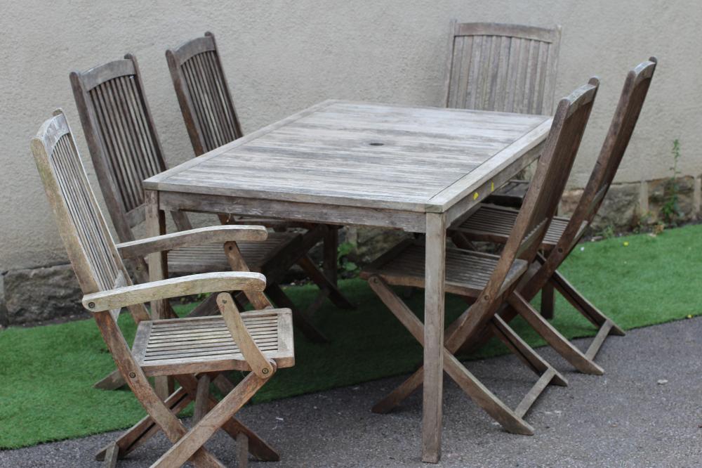 A "BEAUFORT 10" HARDWOOD DINING SUITE by Scandinavian Design Image