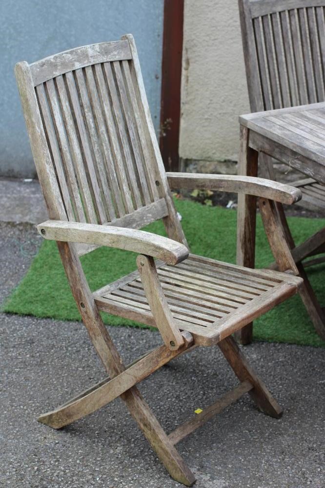 A "BEAUFORT 10" HARDWOOD DINING SUITE by Scandinavian Design Image