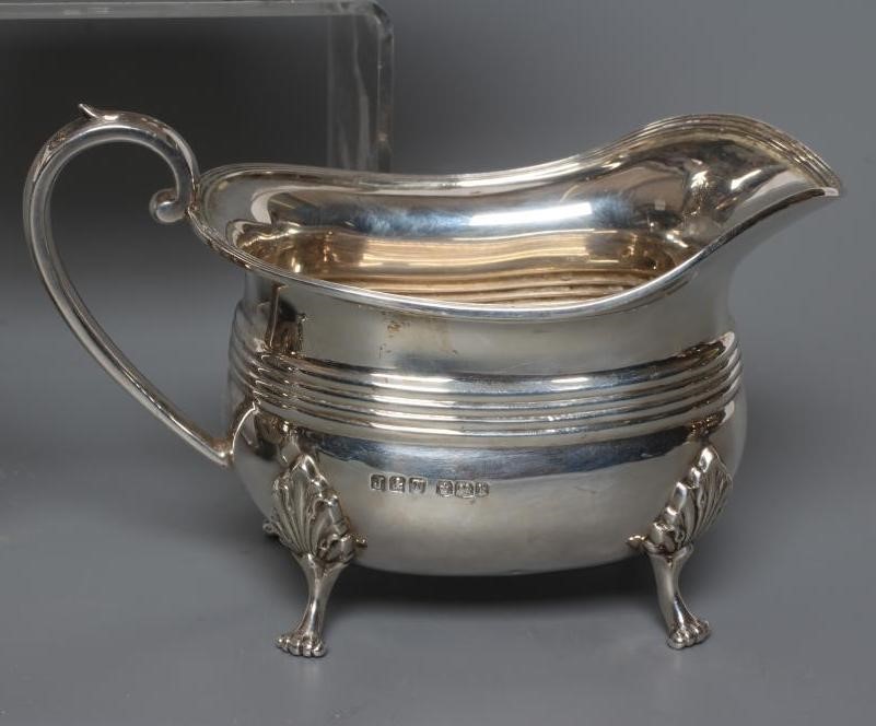 A THREE PIECE SILVER TEA SERVICE Image