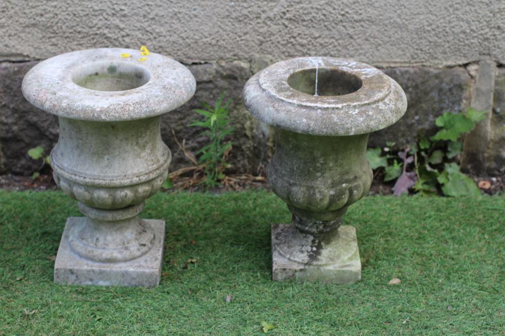 A SMALL PAIR OF WHITE MARBLE URNS of half fluted campana form with everted rim and square base, 9 Image