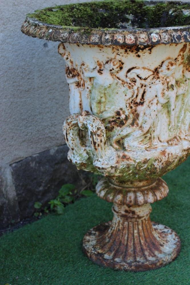 A CAST IRON URN Image