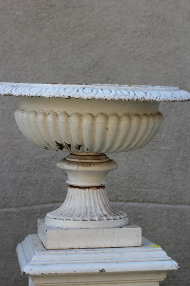 A VICTORIAN CAST IRON URN Image