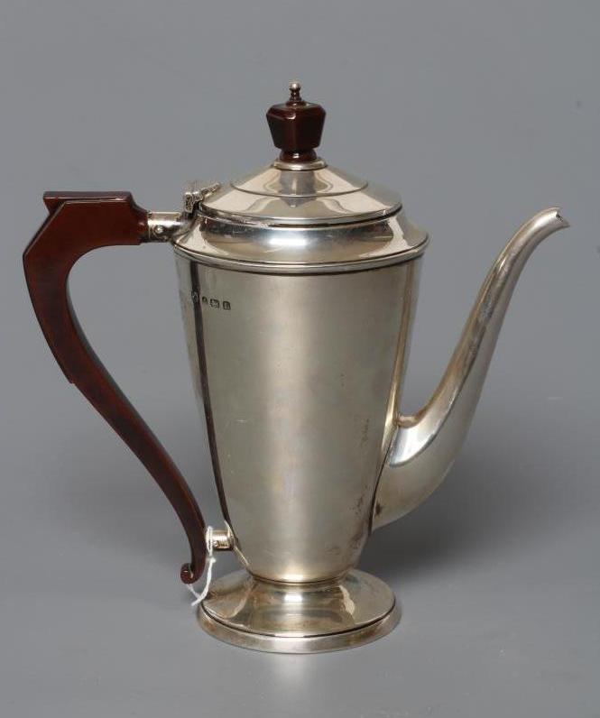 AN ART DECO SILVER COFFEE POT Image