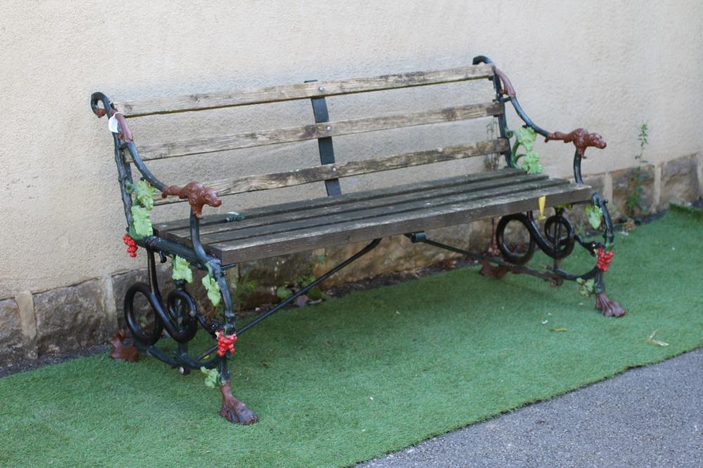 A VICTORIAN CAST IRON BENCH in Grape and Serpent pattern, with slatted wood back and seat, 61 1/2" x Image