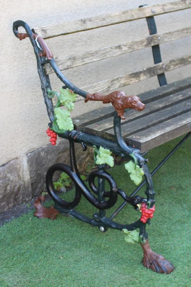 A VICTORIAN CAST IRON BENCH in Grape and Serpent pattern, with slatted wood back and seat, 61 1/2" x Image