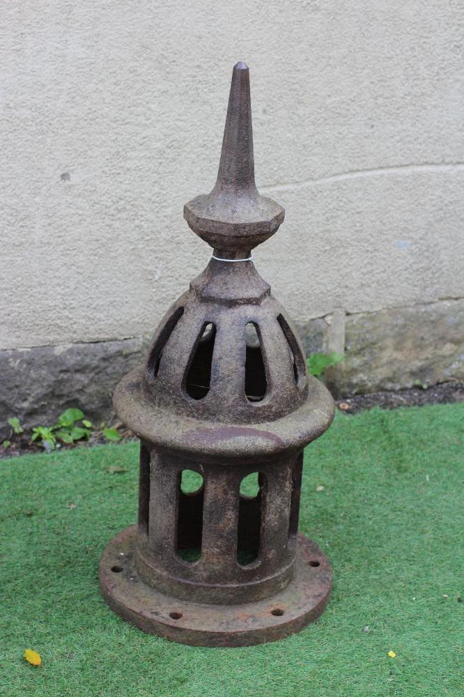 A VICTORIAN CAST IRON AIR VENT of pierced cylindrical form, the domed top surmounted by a faceted Image