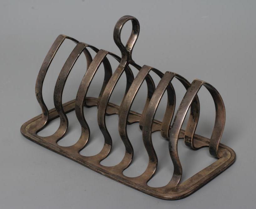 A SILVER SEVEN BAR TOASTRACK Image