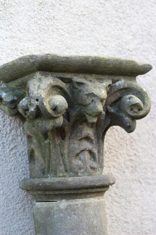 A SANDSTONE ENGAGED COLUMN with Corinthian type capital, plain shaft and flared square base, 12" x Image