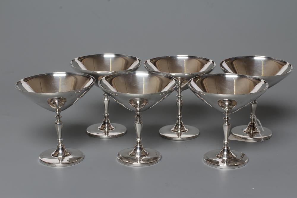 A SET OF SIX SILVER COUPES Image