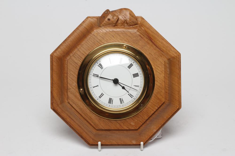 A ROBERT THOMPSON OAK CASED WALL TIMEPIECE Image