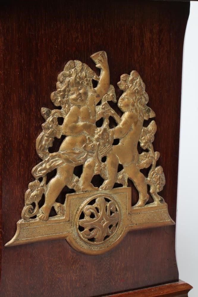 A FRENCH MAHOGANY AND BRASS TABLE CLOCK Image