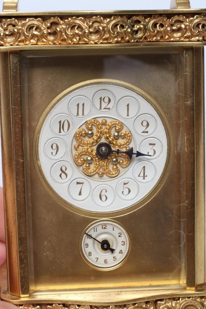 A BRASS CASED CARRIAGE CLOCK Image