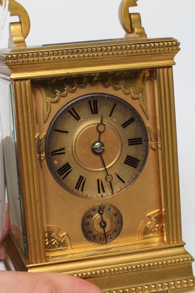 A FRENCH BRASS CASED CARRIAGE CLOCK Image