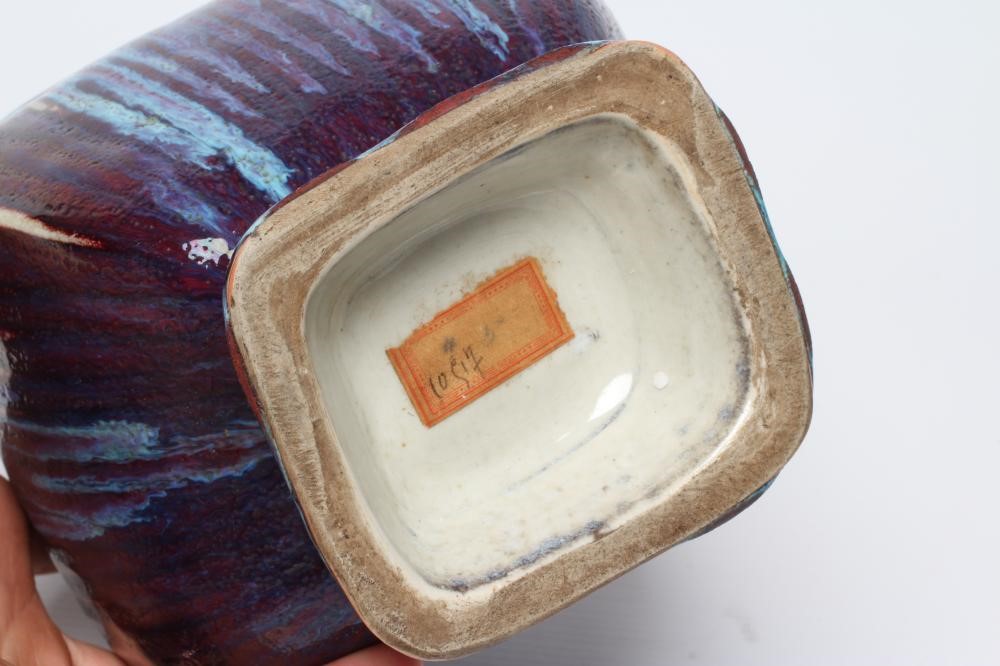 A CHINESE STONEWARE ARCHAISTIC VASE of square baluster form with two lug handles, in a streaky Image