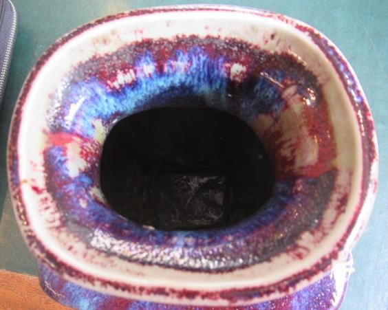 A CHINESE STONEWARE ARCHAISTIC VASE of square baluster form with two lug handles, in a streaky Image