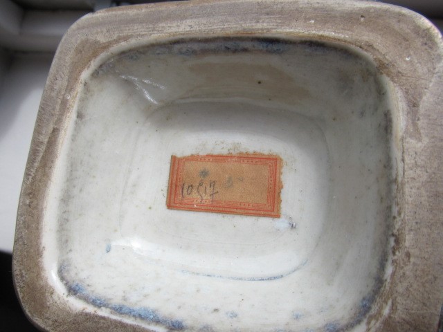 A CHINESE STONEWARE ARCHAISTIC VASE of square baluster form with two lug handles, in a streaky Image