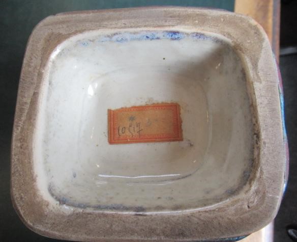 A CHINESE STONEWARE ARCHAISTIC VASE of square baluster form with two lug handles, in a streaky Image