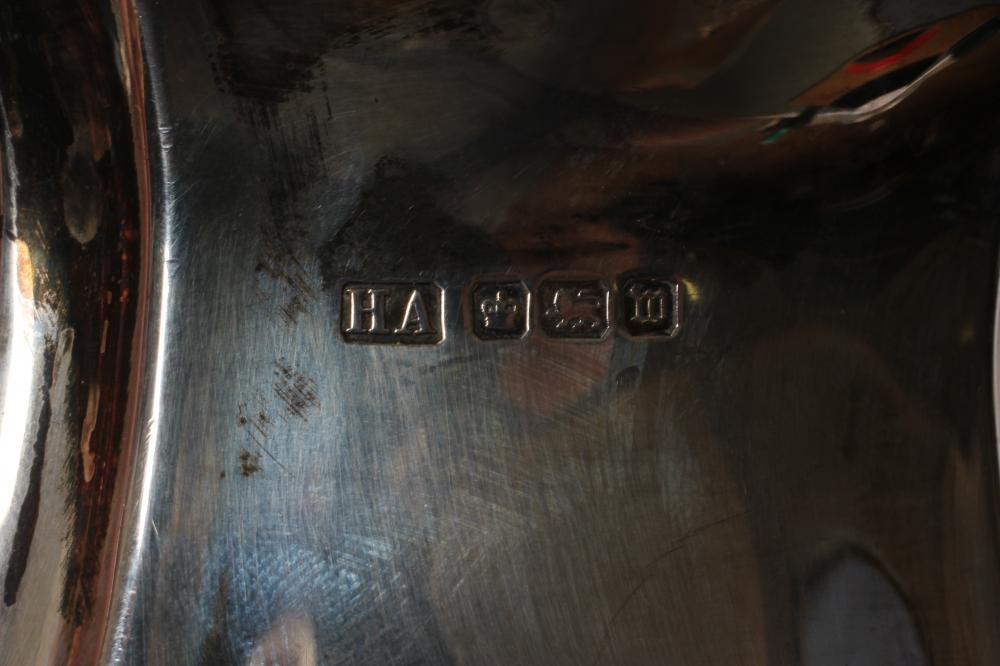 A SILVER HOT WATER JUG Image