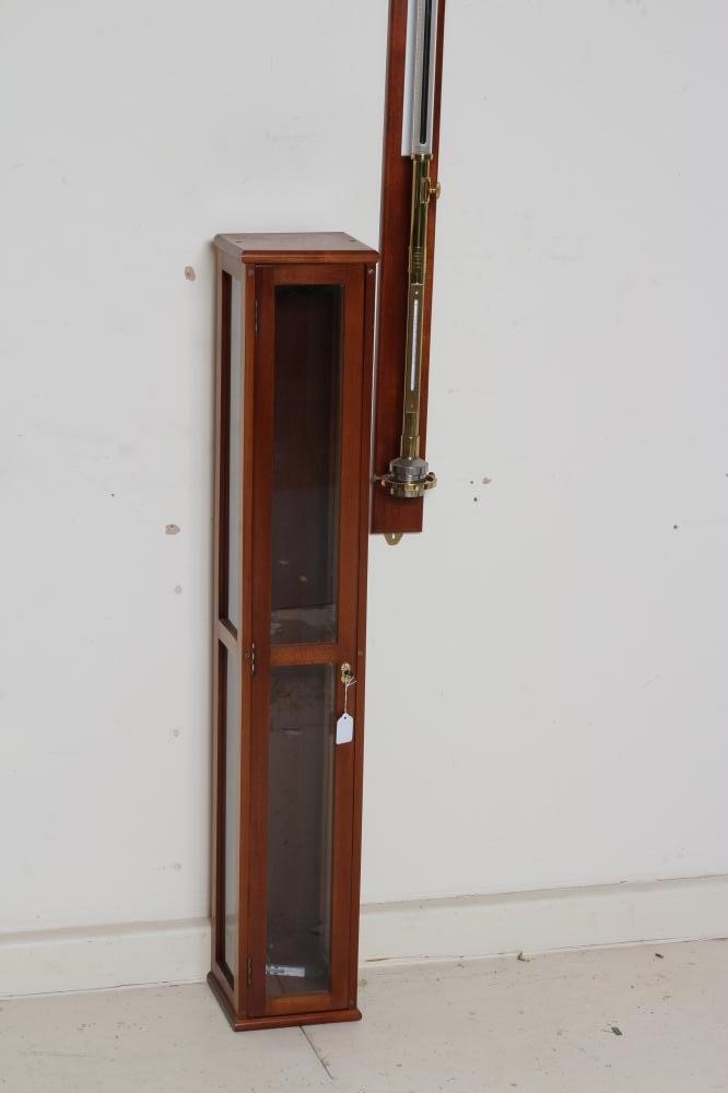A BRASS MARINE STICK BAROMETER Image