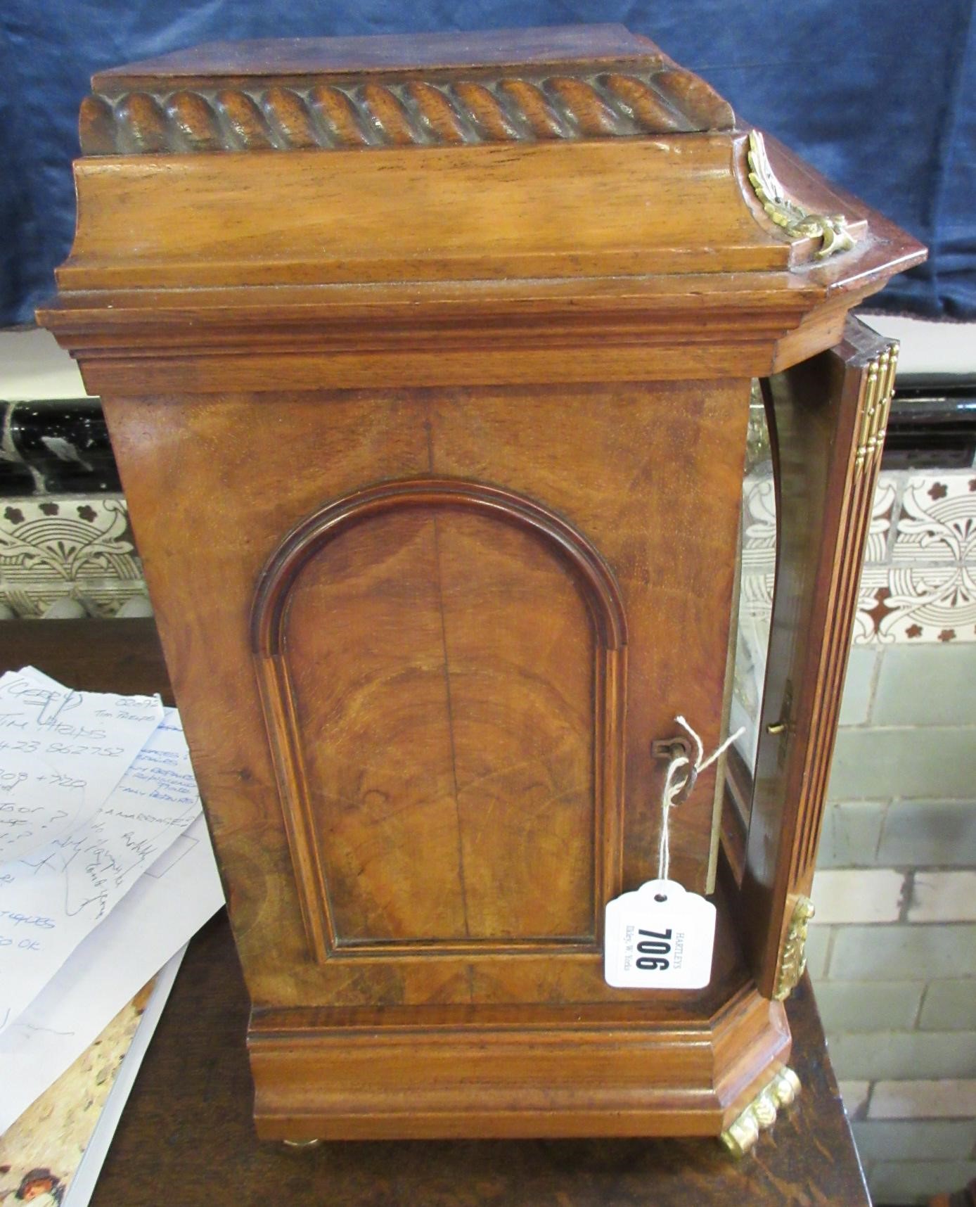 A LENZKIRCH LIGHT OAK AND WALNUT CASED TABLE CLOCK Image