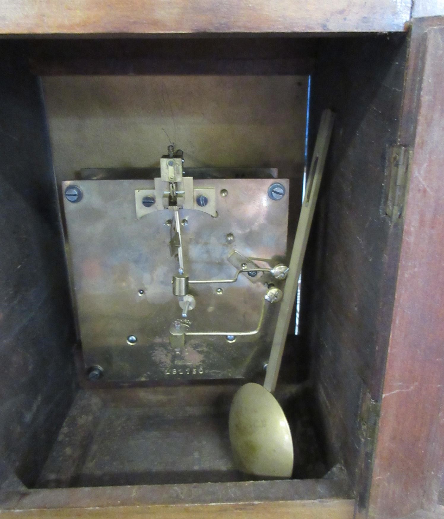 A LENZKIRCH LIGHT OAK AND WALNUT CASED TABLE CLOCK Image