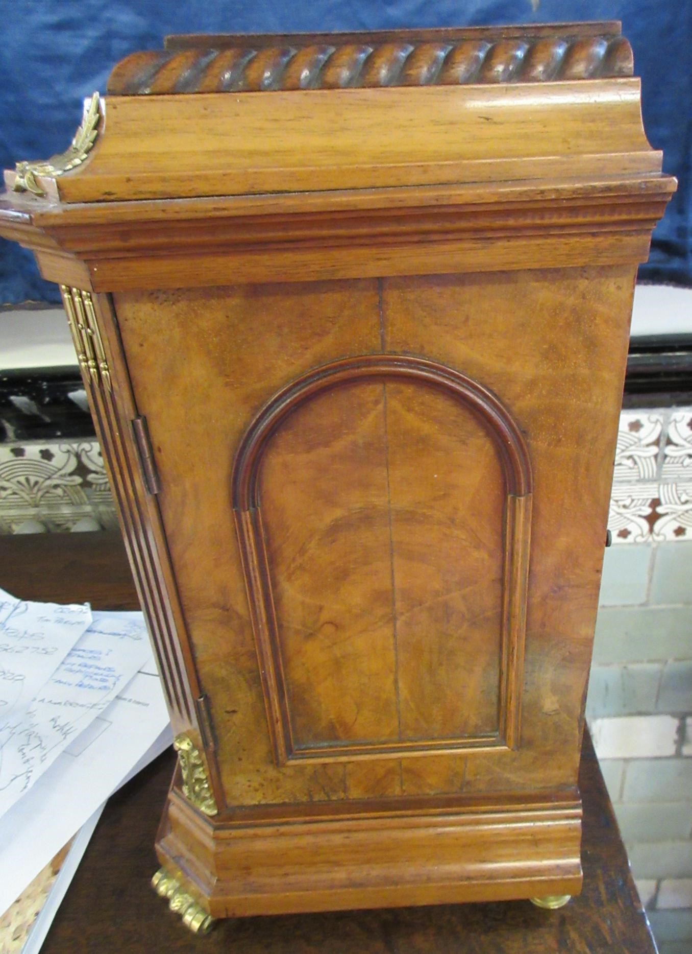 A LENZKIRCH LIGHT OAK AND WALNUT CASED TABLE CLOCK Image