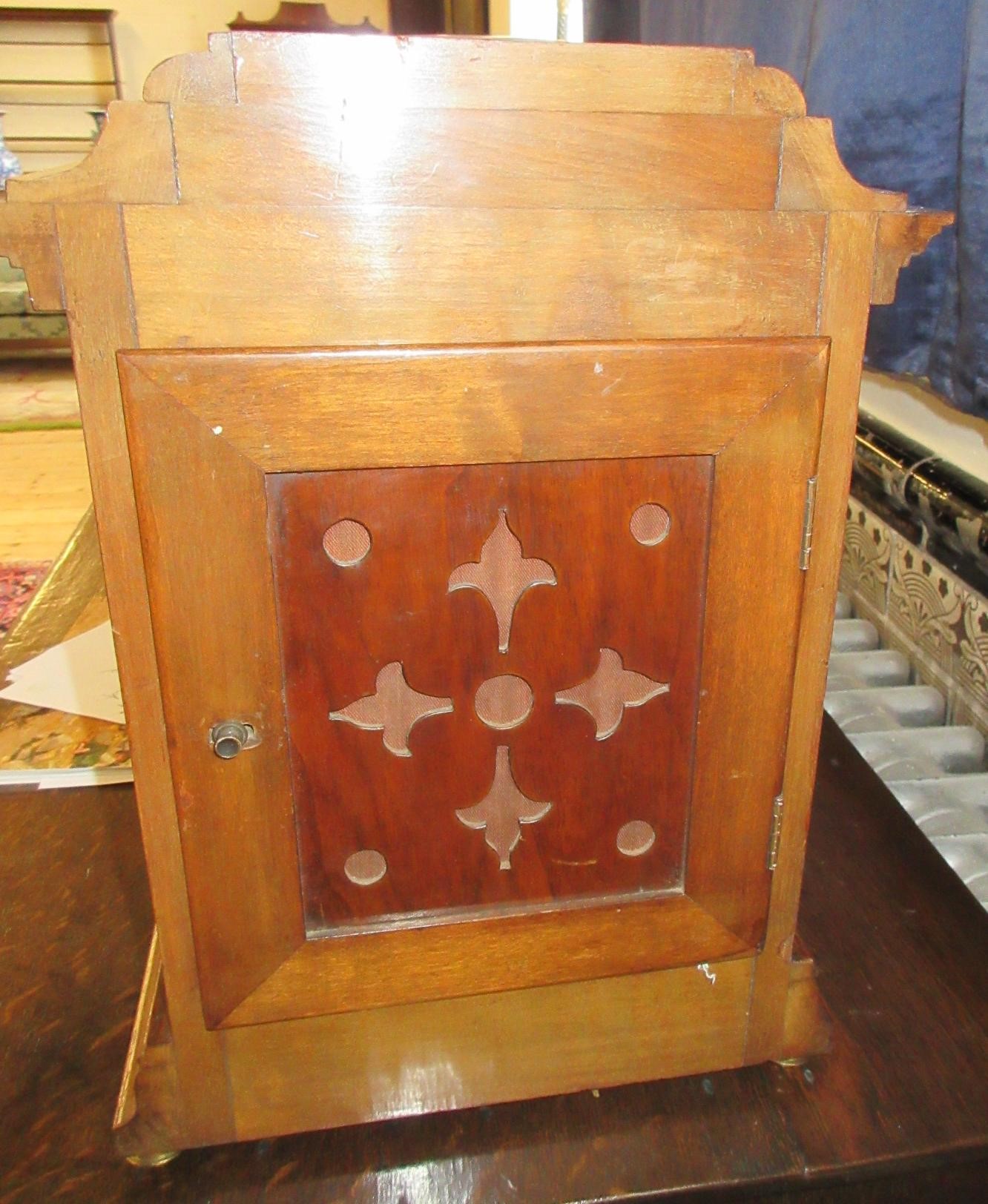 A LENZKIRCH LIGHT OAK AND WALNUT CASED TABLE CLOCK Image