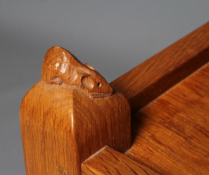 A ROBERT THOMPSON OAK TROLLEY of oblong two tier form, the square uprights with pointed finials, Image