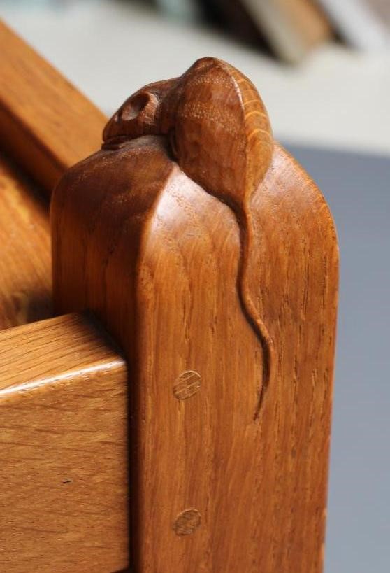 A ROBERT THOMPSON OAK TROLLEY of oblong two tier form, the square uprights with pointed finials, Image