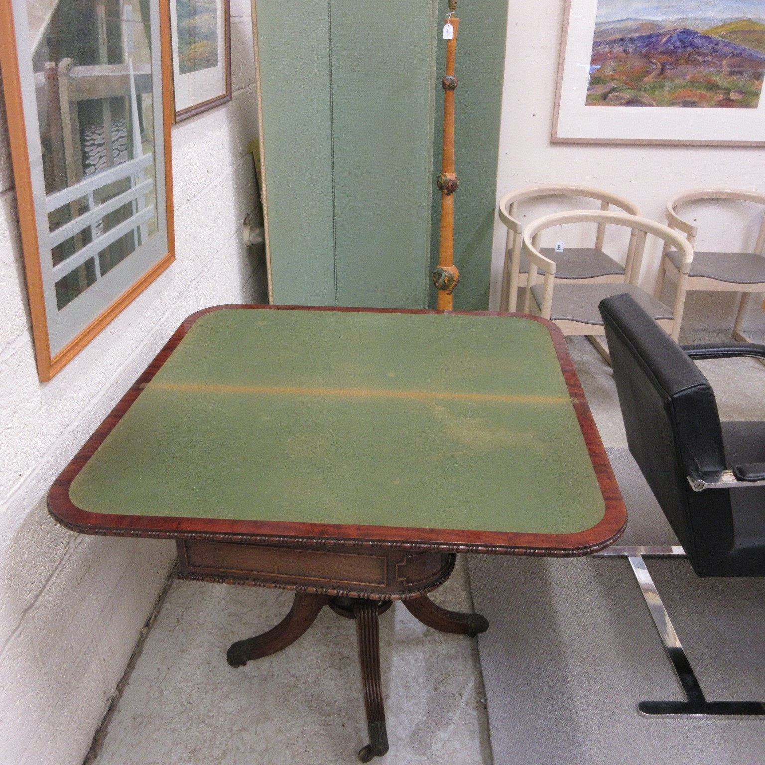 A ROBERT THOMPSON OAK TROLLEY of oblong two tier form, the square uprights with pointed finials, Image