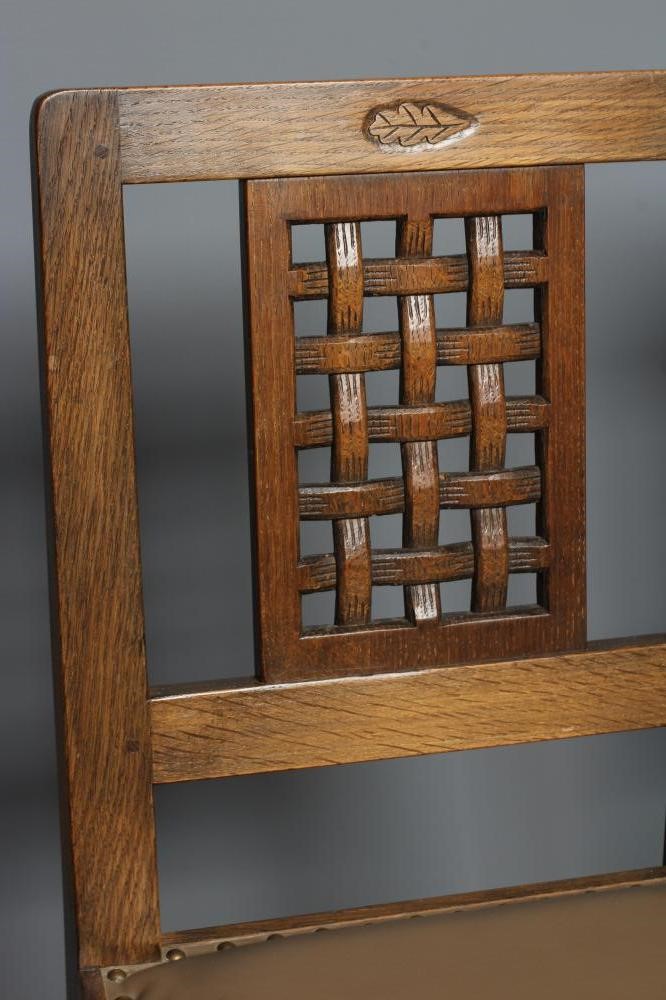 A DAVID LANGSTAFF SET OF SIX ADZED OAK DINING CHAIRS Image