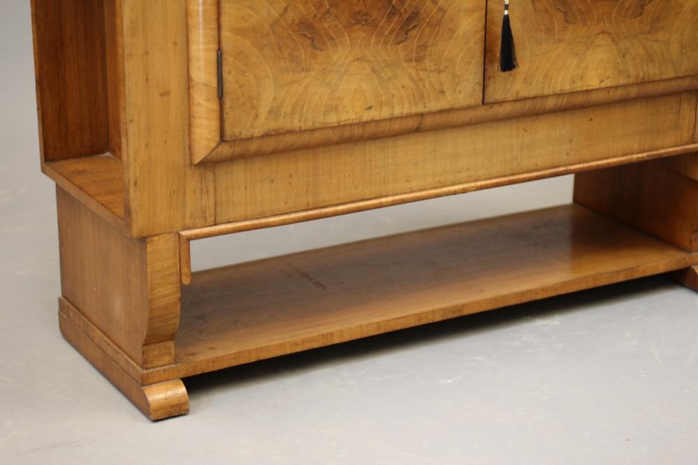 AN ART DECO WALNUT CABINET Image