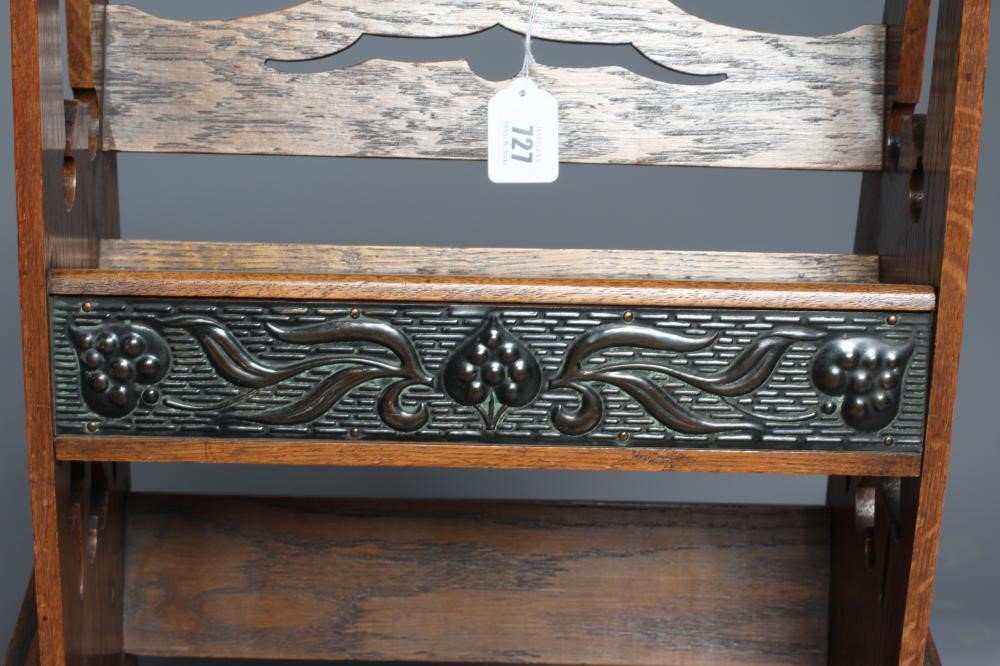 AN ARTS AND CRAFTS OAK BOOKSTAND Image