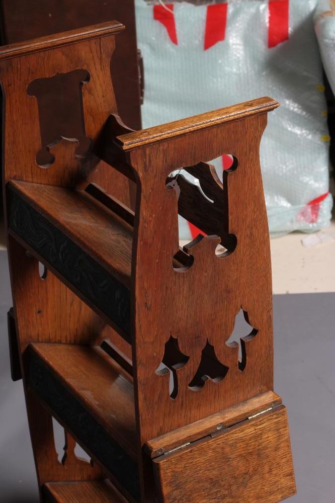 AN ARTS AND CRAFTS OAK BOOKSTAND Image