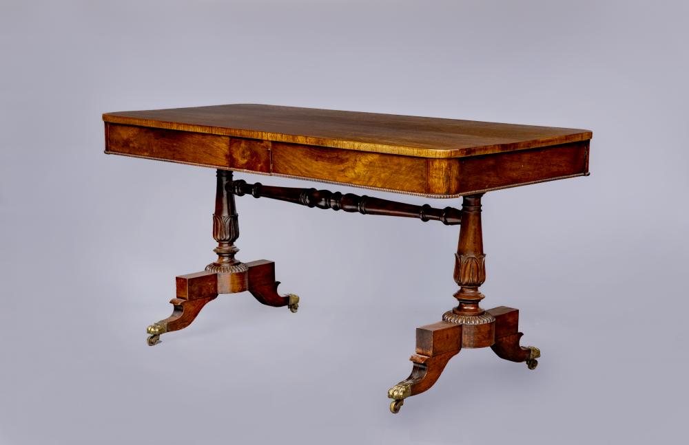A GEORGE IV ROSEWOOD PILLAR END LIBRARY TABLE Image