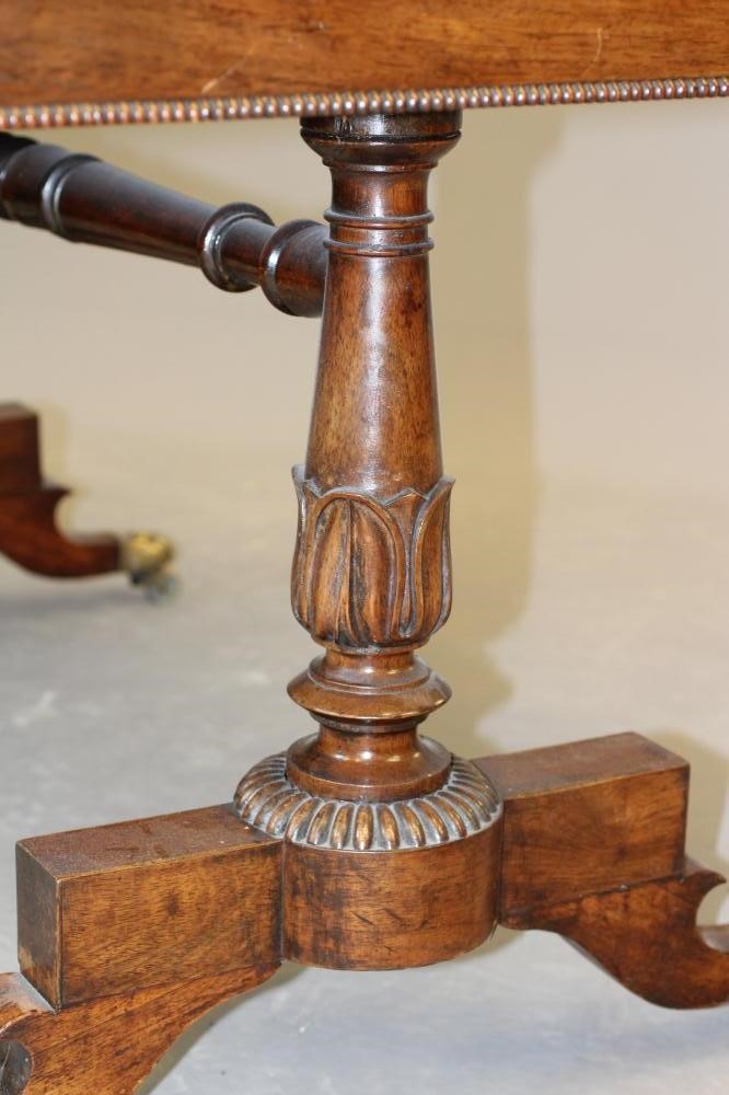 A GEORGE IV ROSEWOOD PILLAR END LIBRARY TABLE Image