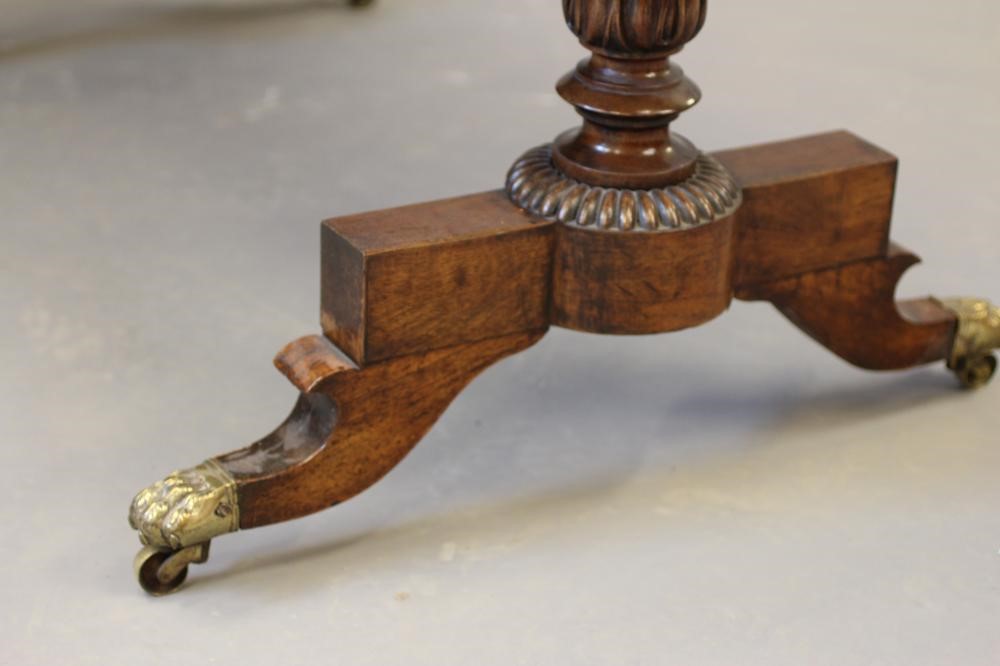 A GEORGE IV ROSEWOOD PILLAR END LIBRARY TABLE Image