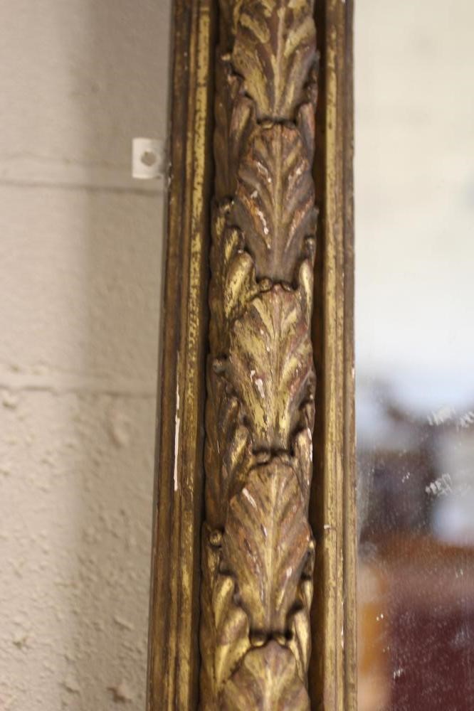 A REGENCY CARVED GILT GESSO PIER GLASS Image