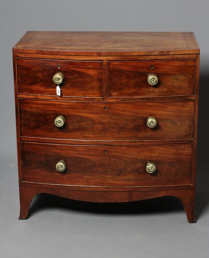 A REGENCY MAHOGANY BOWED CHEST Image